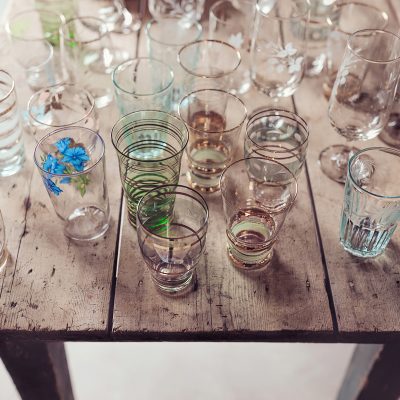 Water glasses on rustic workbench